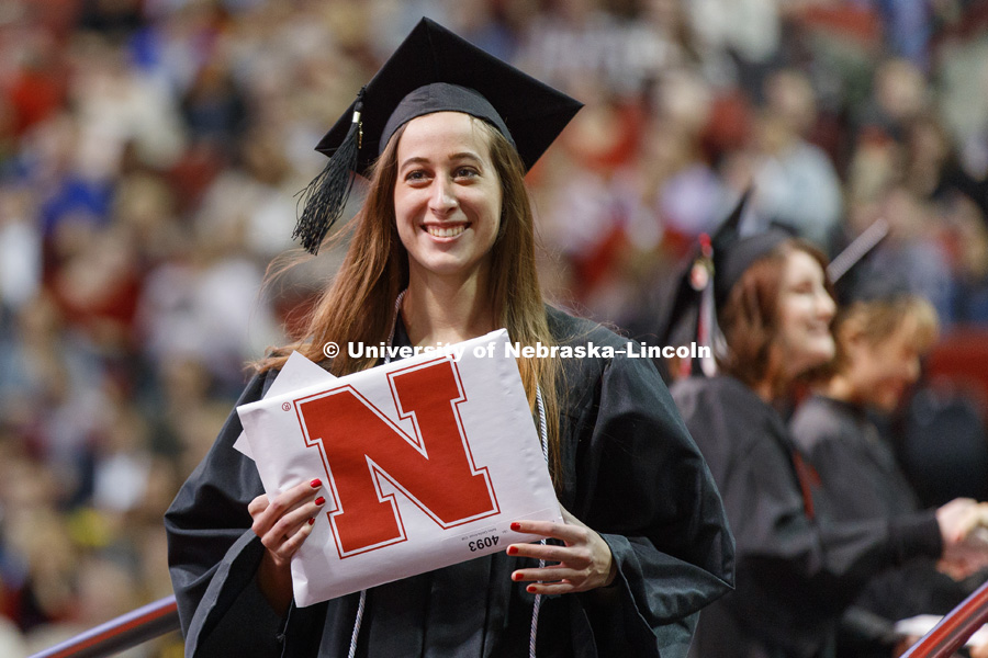 Bailey Kruse celebrates her College of Business degree. Undergraduate Commencement at Pinnacle Bank Arena. December 16, 2017. Photo by Craig Chandler / University Communication.