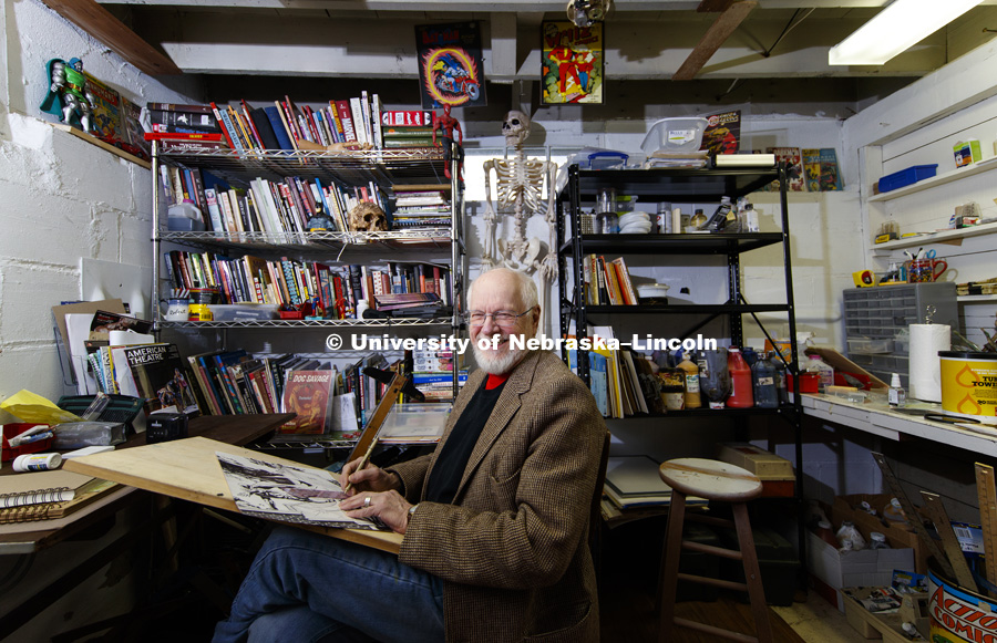 Bob Hall works in his basement studio. Hall, comic book artist and artist for Virus Comic Books and a UNL alumni. January 18, 2018. Photo by Craig Chandler / University Communication.
