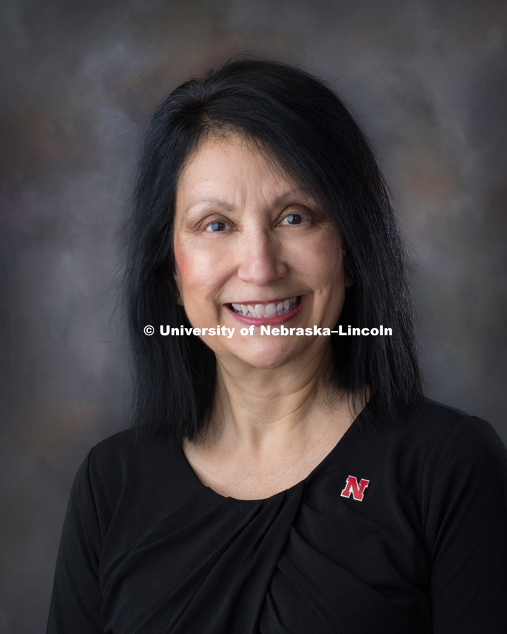 Studio portrait of Annette Contreras, Office Associate Services for Students with Disabilities. January 29, 2018. Photo by Greg Nathan, University Communication Photography.