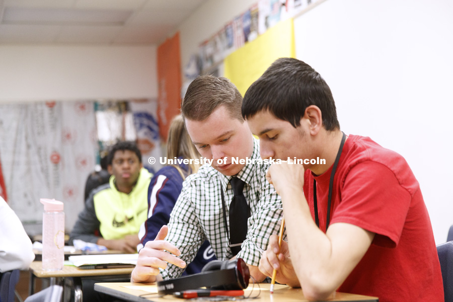 Braedon Root works with his Economics students while student teaching at Northstar High School. February 15, 2019. Photo by Craig Chandler / University Communication.