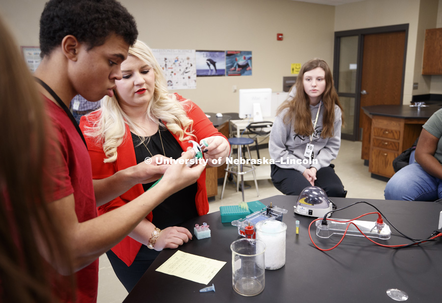 Cassidy Daly gives a DNA demonstration while doing her Biology student teaching at Northeast High School. February 16, 2019. Photo by Craig Chandler / University Communication.
