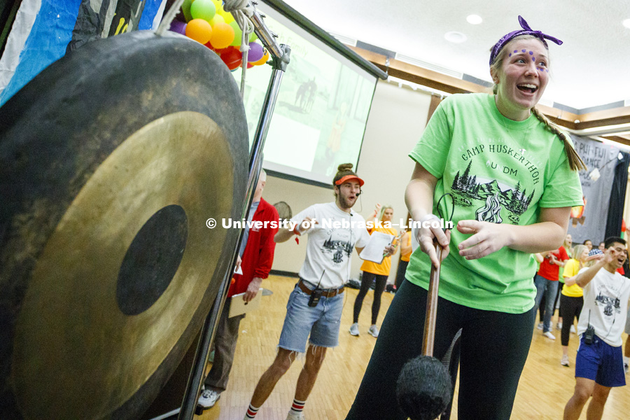 Kendall Kelly, Chi Omega, reacts after sounding the gong. She raised an extra $100 after the marathon began to get to bang the gong. 1274 Nebraska students signed up to be part of the Huskerthon Dance Marathon for Children's Hospital in Omaha. February 17