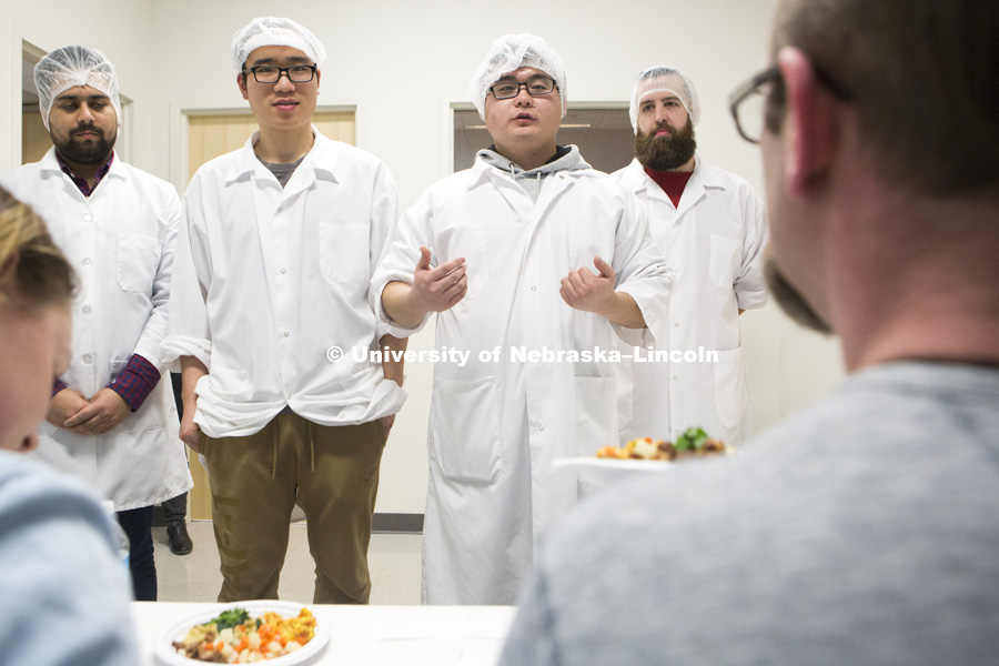 Tushar Verma (left), Xinyao Wei, Long Chen and Jared Kleine present their Biang Biang noodles to the judges of the 2018 Battle of the Food Scientists at the Food Innovation Center on Nebraska Innovation Campus. February 28, 2018. Photo by James Wooldridge