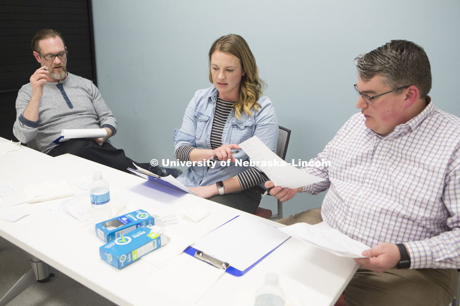 Judges Paul Phillips (left) of ShillingBridge Cork and Tap, Ashley Mueller of the Nebraska Extension and Scott Keys from NuTek Food Science debate the dishes in the 2018 Battle of the Food Scientists at the Food Innovation Center on Nebraska Innovation