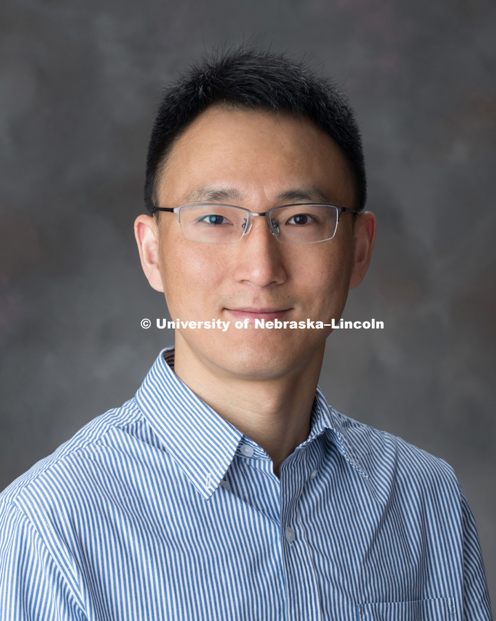 Studio portrait of Yufeng Ge, Assistant Professor, Biological Systems Engineering. March 28, 2018. Photo by Greg Nathan, University Communication Photography.