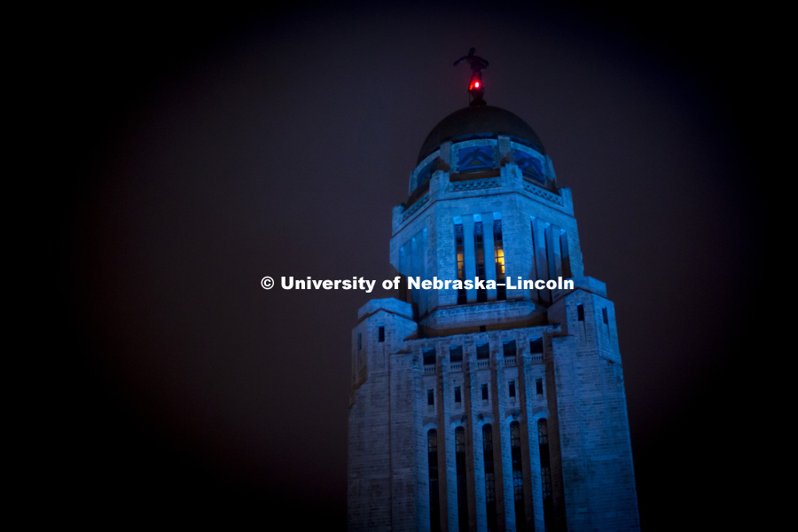 The state Capitol was lit in blue light Monday night. Light It Up Blue is an initiative of Autism Speaks sponsored by the Munroe-Meyer Institute which is part of UNMC. April 2, 2018. Photo by Alyssa Mae for University Communication.