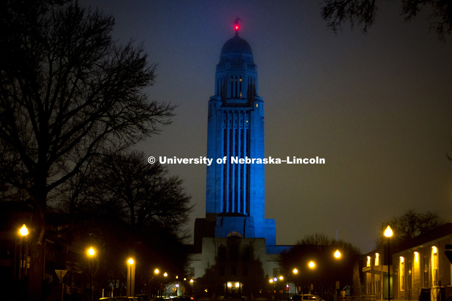 The state Capitol was lit in blue light Monday night. Light It Up Blue is an initiative of Autism Speaks sponsored by the Munroe-Meyer Institute which is part of UNMC. April 2, 2018. Photo by Alyssa Mae for University Communication.