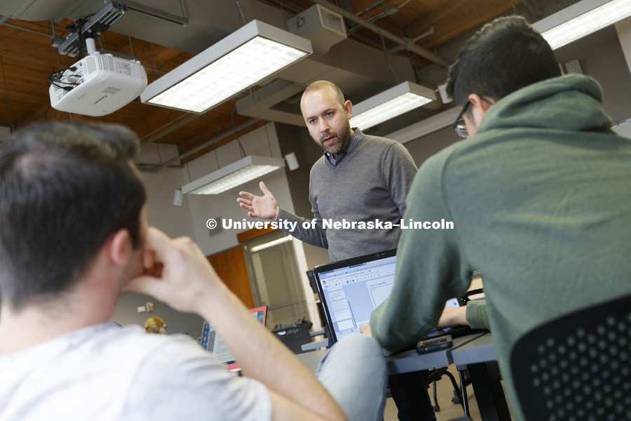 Daniel Piatkowski, Assistant Professor of Community & Regional Planning, discusses student projects, during collaboration time in CRPL 495 and 895- Selected Topics in Community and Regional Planning. College of Architecture. April 11, 2019. Photo by Craig