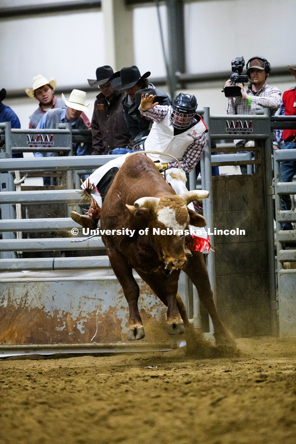 Jack Miller rides a bull during his first bull riding competition. 60th anniversary of the University of Nebraska-Lincoln Rodeo Club. April 20, 2018. Photo by Craig Chandler / University Communication.