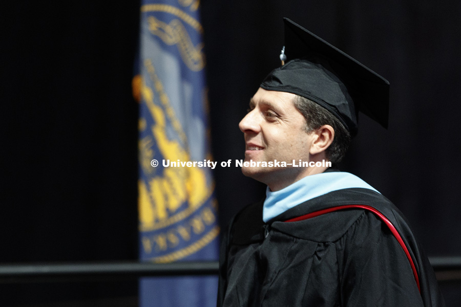 Hadi Pir receives his masters of education degree. Graduate Commencement at Pinnacle Bank Arena. May 4, 2018. Photo by Craig Chandler / University Communication.