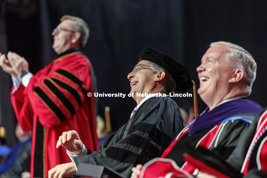 Alexander Payne watches a tribute video on the big screen before receiving his honorary doctorate and delivering the commencement address. Undergraduate Commencement at Pinnacle Bank Arena. May 5, 2018. Photo by Craig Chandler / University Communication.