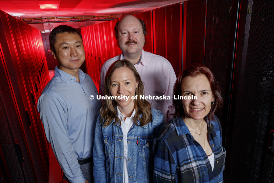 Quantitative Life Science Initiative group in the super computer in Schorr Center. Back row: Hengle Jiang, Jean-Jack Riethoven  Front row: Emelie Harstad, Jennifer Clarke. May 11, 2018. Photo by Craig Chandler / University Communication.