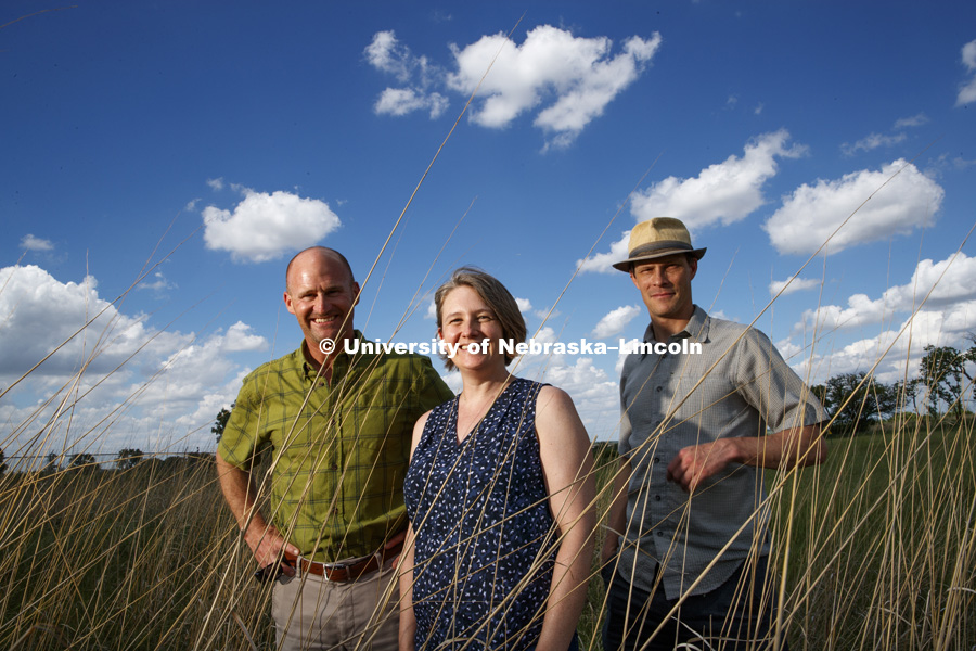 Jay Storz, Kristi Montooth, Colin Meiklejohn research animal and plant changes to their environment. Photo at Nine Mile Prairie northwest of Lincoln. May 30, 2018. Photo by Craig Chandler / University Communication.