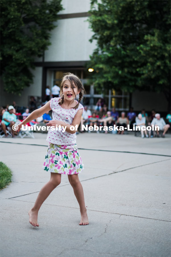 Young girl dances at the Jazz in June concert. Concerts in the Jazz in June series are at 7 p.m. each Tuesday in June in the sculpture garden west of the Sheldon Museum of Art, 12th and R streets. June 14, 2016. Photo by Justin Mohling for University Communication.