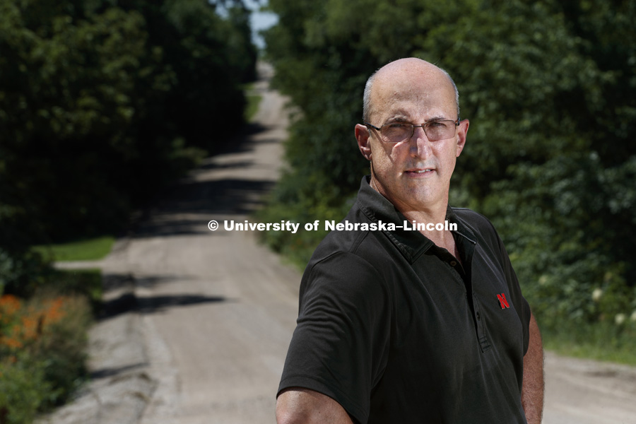 Kirk Dombrowski, Professor of Sociology, is researching the effects of the opioid crisis on rural America. He is shown on a rural Lancaster county road. June 27, 2018. Photo by Craig Chandler / University Communication.