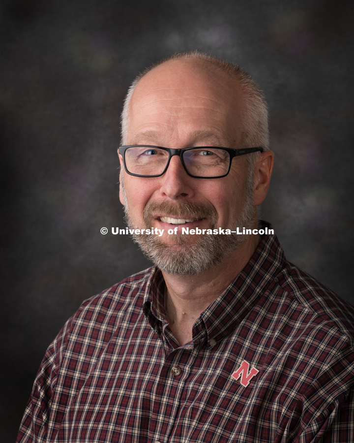 Studio portrait of Kurt Wulser, Electronics Technician, Chemistry. August 9, 2018. Photo by Greg Nathan, University Communication Photographer.