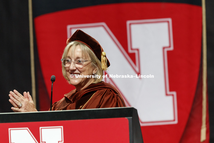 Executive Vice Chancellor, Donde Plowman applauds the effort of each graduate as she delivers her commencement address. Summer Commencement at Pinnacle Bank Arena. August 11, 2018. Photo by Craig Chandler / University Communication.