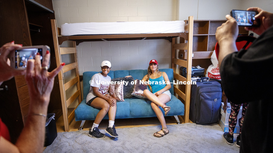 Roommates Analiese Raley, from Clovis, California, left, and Courtney Wallace, from Omaha, and pose for photos in their Smith Hall room. The roommates are also on the Husker Softball team. Residence Hall move-in. August 16, 2018. Photo by Craig Chandler /