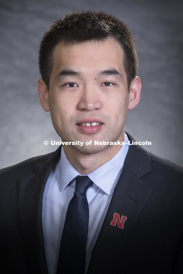 Studio portrait of Ron Liu, Assistant Professor, Finance, College of Business. August 17, 2018. Photo by Greg Nathan, University Communication Photography.