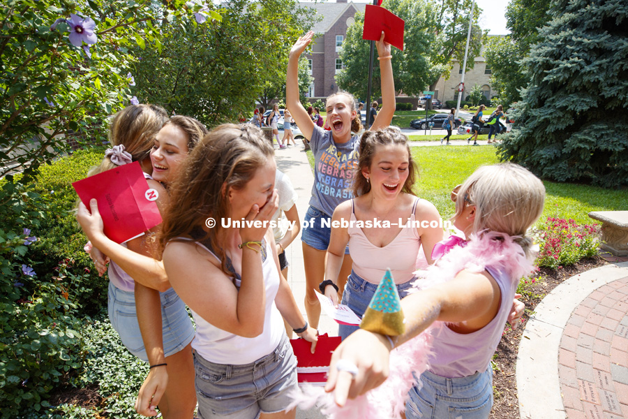 A group of new Delta Gamma sisters are greeted at the sorority. Bid Day for Greek Sororities. August 18, 2018. Photo by Craig Chandler / University Communication.