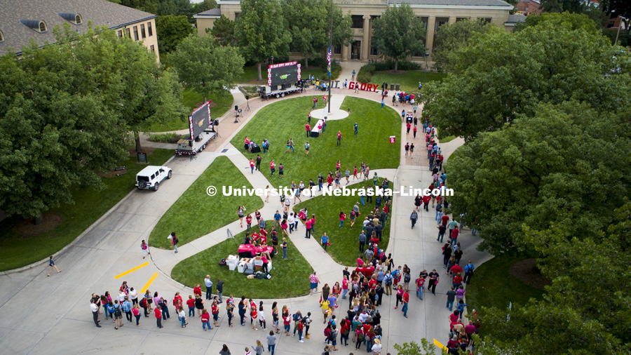Lines for t-shirts and food snake around the east campus loop. In Our Grit, Our Glory brand reveal party on east campus at the Nebraska Union. August 31, 2018. Photo by Craig Chandler / University Communication.