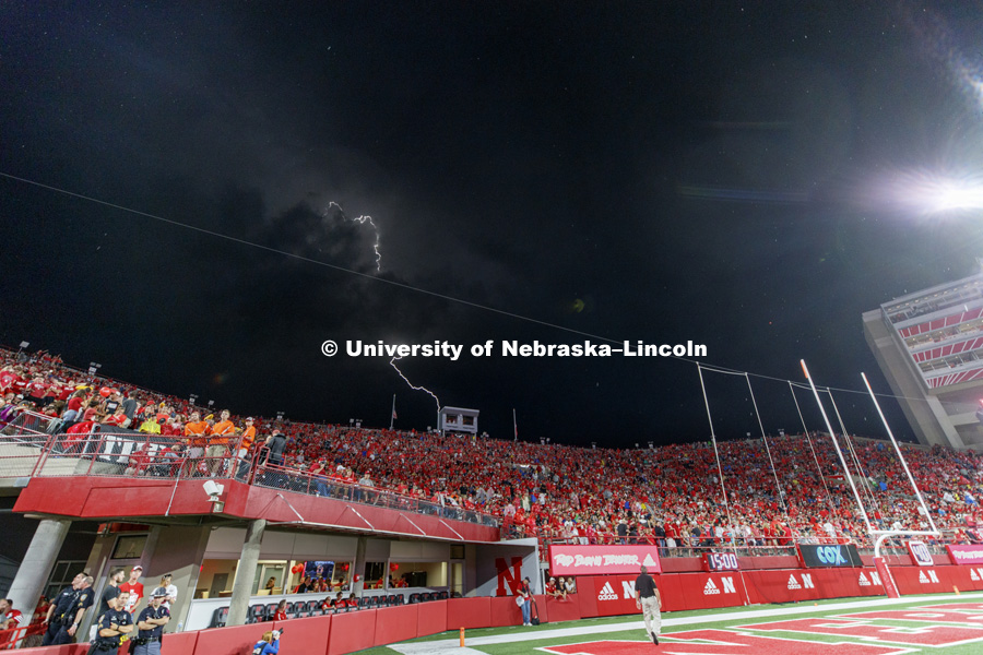 Storm clouds rolled in and lightening lit up the sky for the Nebraska football vs. Akron Zips game. September 1, 2018. Photo by Craig Chandler / University Communication.