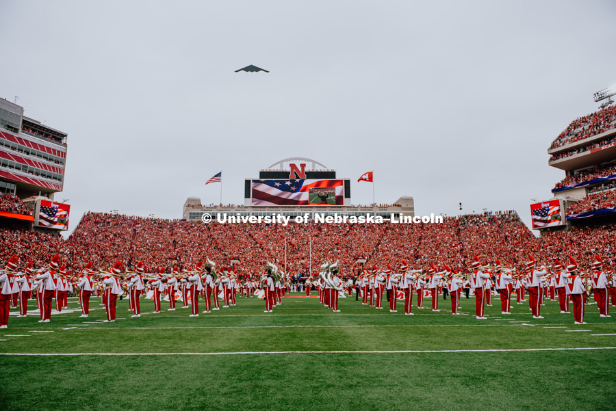 B2 Flying over the stadium as band plays national anthem. Nebraska vs. Colorado football game in Memorial Stadium. September 8, 2018. Photo by Justin Mohling / University Communication.