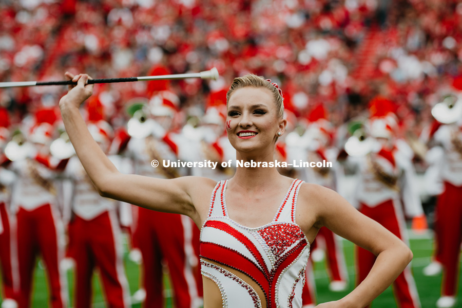 Twirler during halftime show at the Nebraska vs. Colorado football game in Memorial Stadium. September 8, 2018. Photo by Justin Mohling / University Communication.