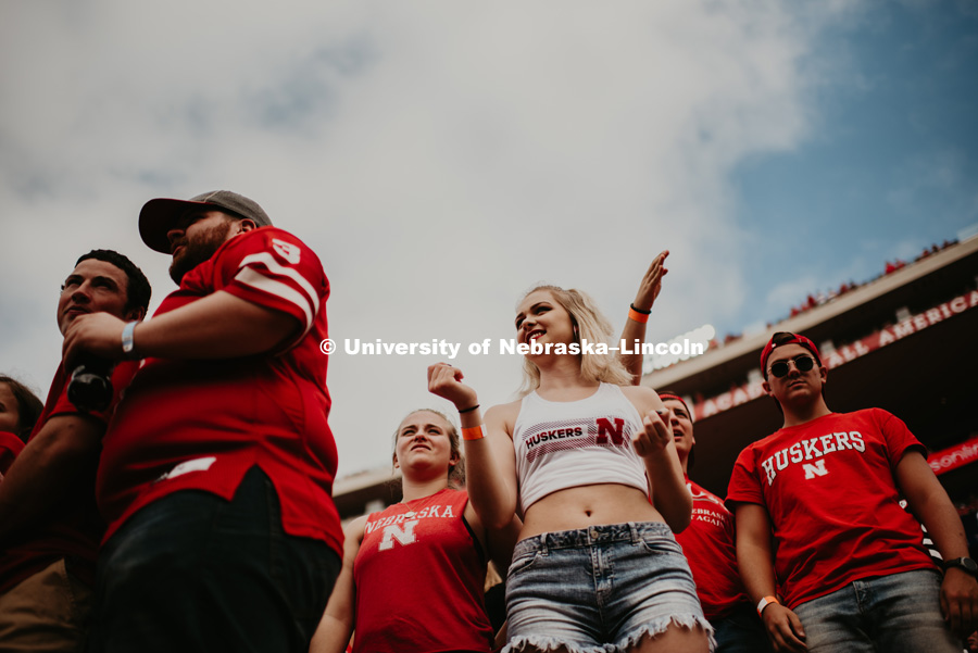 Students cheering at the Nebraska vs. Colorado football game in Memorial Stadium. September 8, 2018. Photo by Justin Mohling / University Communication.