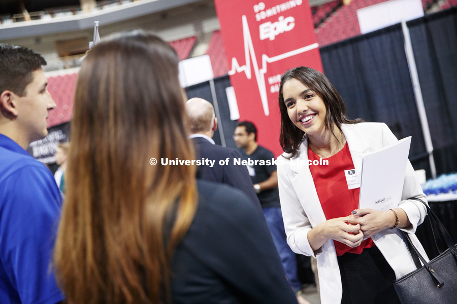 Natalia Ferreira talks with recruiters at the STEM Career Fair (Science, Technology, Engineering, and Math) in Pinnacle Bank Arena. September 25, 2018. Photo by Craig Chandler / University Communication.