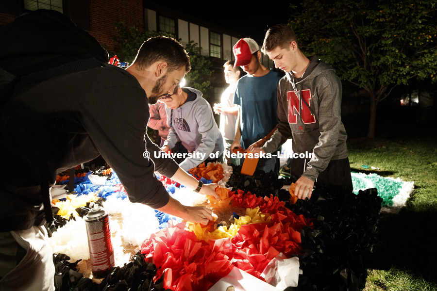 Tissue becomes Herbie Husker on the lawn outside Sigma Chi. Homecoming 2018 decorating yard displays. September 27, 2018. Photo by Craig Chandler / University Communication.