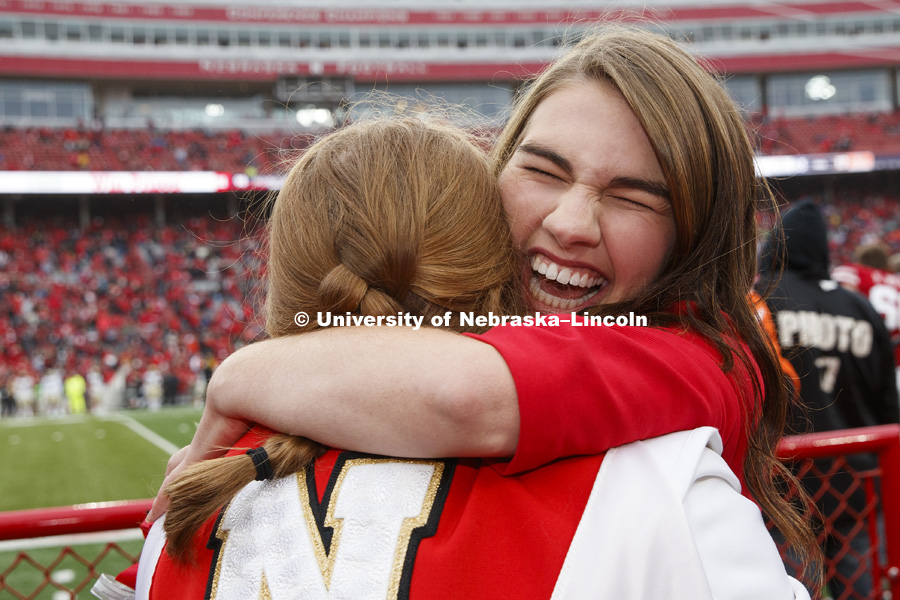 Queen Monica Rogers is hugged by friends after being crowned Homecoming Queen. Seniors Gage Hoegermeyer of Herman and Monica Rogers of Omaha were crowned king and queen at the University of Nebraska–Lincoln's homecoming celebration. Hoegermeyer and Rogers, elected in an online vote of the student body on Sept. 27, were crowned on the field at Memorial Stadium during halftime of the Sept. 29 Nebraska-Purdue football game. September 29, 2018. Photo by Craig Chandler / University Communication.