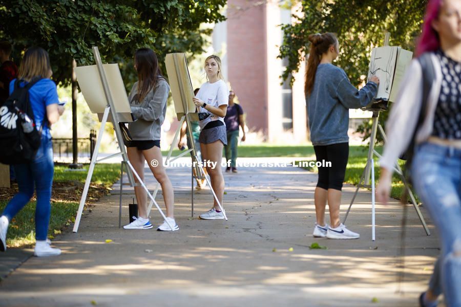 DSGN120 Design Drawing students work with instructor Chip Stanley as they draw outside Architecture Hall. October 3, 2018. Photo by Craig Chandler / University Communication