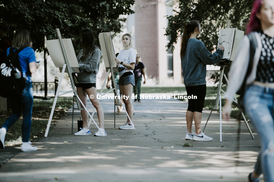 DSGN120 Design Drawing students work with instructor Chip Stanley as they draw outside Architecture Hall. October 3, 2018. Photo by Craig Chandler / University Communication