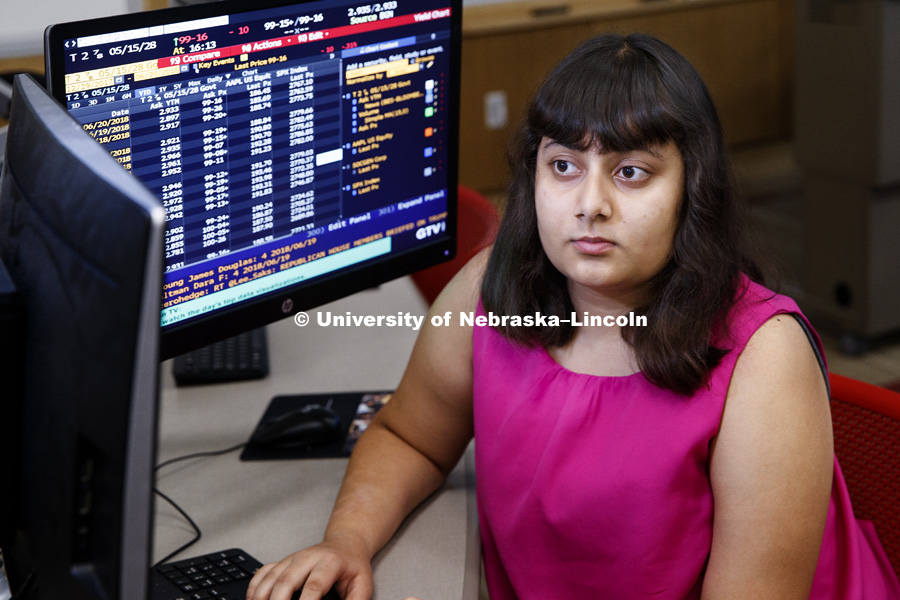 Shaurya Sharma uses a College of Business Bloomberg terminal in the trading room. College of Business Photo Shoot. October 5, 2018. Photo by Craig Chandler / University Communication.