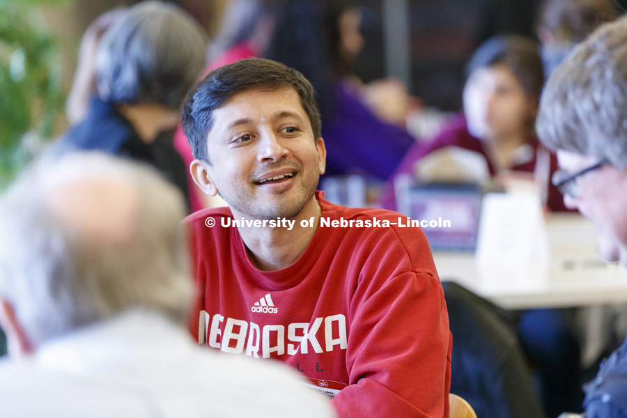 Saravanan Raju, a graduate student in computer science, eats with other first generation college students at the First Gen Nebraska: Share A Meal event in Selleck Dining Hall. October 23, 2018. Photo by Craig Chandler / University Communication.
