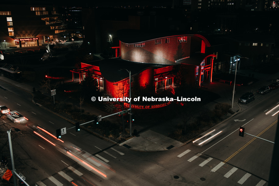The Van Brunt Visitors Center is lit up red at night on City Campus. November 7, 2018. Photo by Justin Mohling, University Communication.