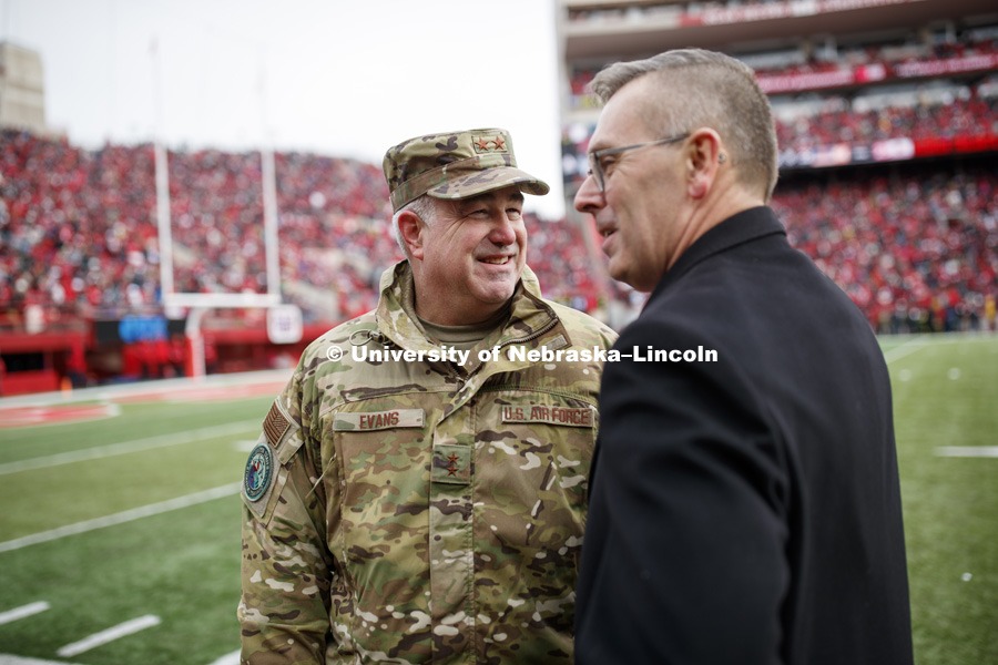 USSTRATCOM’s Assistant to the Commander, Major General Richard Evans talks with Chancellor Ronnie Green after a NSRI presentation at the end of the first quarter. Nebraska vs. Illinois football in Memorial Stadium. November 10, 2018. Photo by Craig Chandler / University Communication.