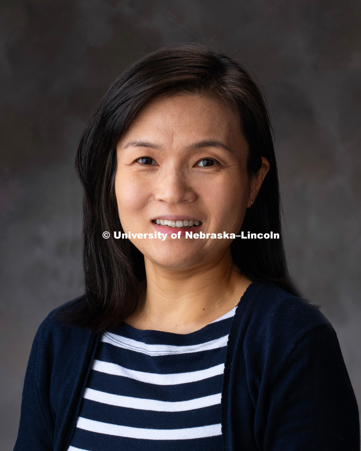 Studio portrait of Yaoling Wang, Instructional Design Tech Specialist, Engineering and Computing Education Core. December 10th, 2018. Photo by Gregory Nathan / University Communication.