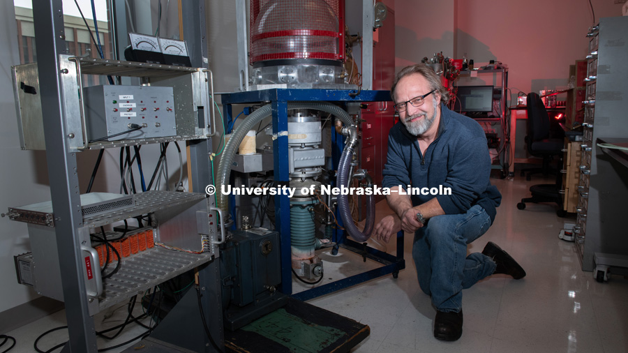 Joe Lutes worked on a two-stage vacuum pump in a lab in Jorgensen Hall. On Dec. 14, Joe will be celebrating his 53rd birthday, and a much bigger milestone — he’ll be finishing a college degree 35 years in the making. December 11th, 2018. Photo by Gregory Nathan /University Communication.