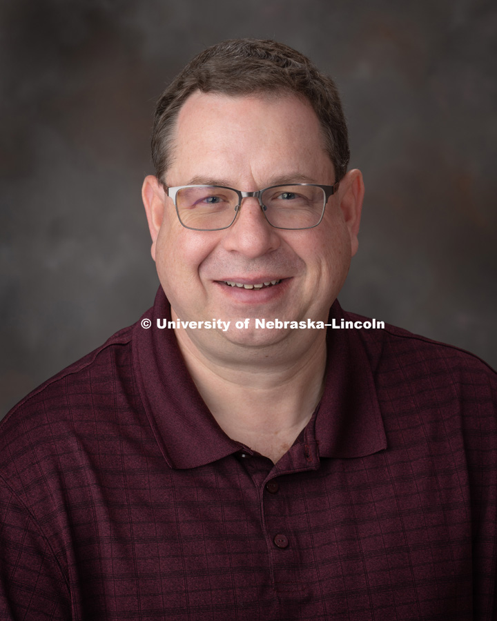 Studio portrait of Ron Kruml, Research Technical Support Specialist, Computer Science and Engineering. December 12, 2018 Photo by Greg Nathan, University Communication.