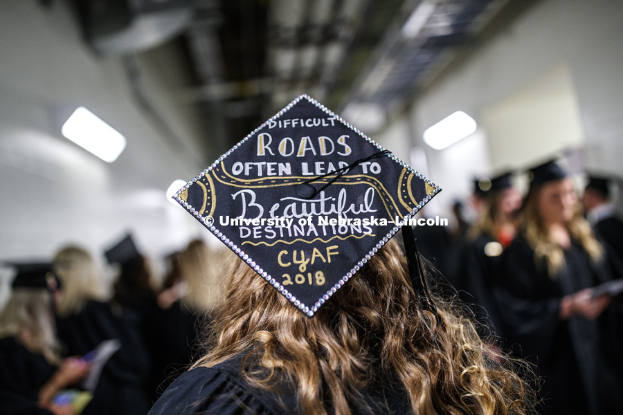 Decorated mortarboard at the Undergraduate Commencement in Pinnacle Bank Arena. December 15, 2018. Photo by Craig Chandler / University Communication.