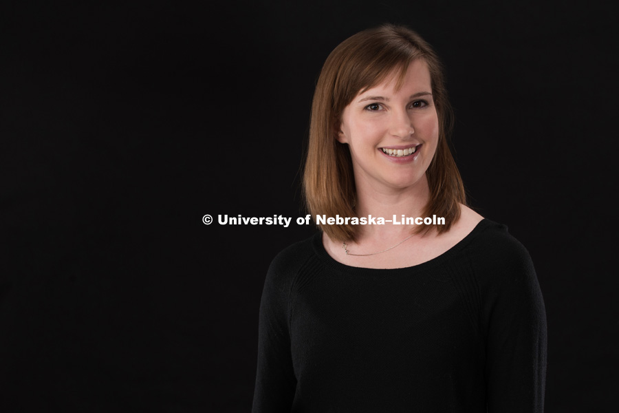 Studio portrait of Leslie Harms, Assistant to the Director of the Glenn Korff School of Music. January 10, 2019. Photo by Greg Nathan, University Communication.