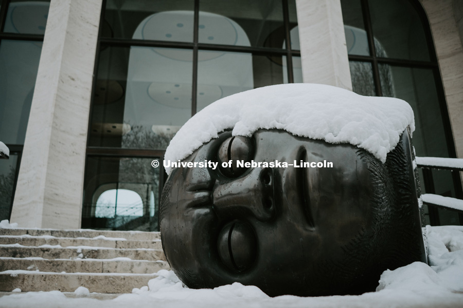 The Fallen Dreamer sculpture is covered in snow outside the Sheldon Art Gallery. January 12, 2019. Photo by Justin Mohling, University Communication.