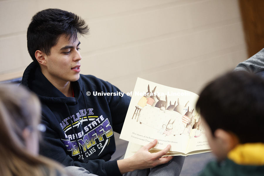 Mario Esquivel, freshman in civil engineering, from Battle Creek, NE, read at the YMCA of Lincoln-Northeast as part of the Husker Reading Challenge. The UNL students reading at the Y are part of the Chancellor's Leadership Class. Students, faculty and staff are invited to honor King’s legacy through a day of service. In collaboration with Prosper Lincoln and Read Aloud Lincoln, the Center for Civic Engagement at Nebraska will host the reading challenge. January 21, 2019. Photo by Craig Chandler / University Communication.