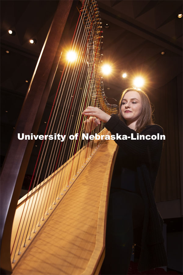 Kelly Callahan play the new harps on the Kimball Hall stage. The Glenn Korff School of Music is building its harp program thanks to the recent purchase of two Lyon and Healy harps, one of which was purchased with support from a generous donor. January 28, 2019. Photo by Craig Chandler / University Communication