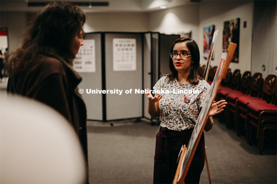 Our Nebraska: Express Yourself Expo in the Oasis Center. Student artist talking about her artwork. January 31, 2019. Photo by Justin Mohling / University Communication.