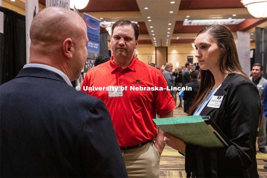 Jill Schindler talks with recruiters from Farm Bureau at the STEM Career Fair (Science, Technology, Engineering, and Math) in Embassy Suites. Sponsored by Career Services. February 12, 2019. Photo by Gregory Nathan / University Communication.