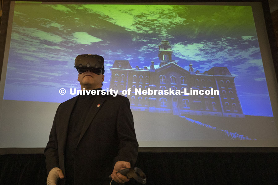 Steven Kolbe demonstrates a virtual reality reconstruction of Nebraska Hall. Kay Logan Peters gives a special Nebraska Lecture as part of Charter Week on the University's early architectural history before a crowd of more than 300 people. February 12, 2019. Photo by Craig Chandler/University Communication.