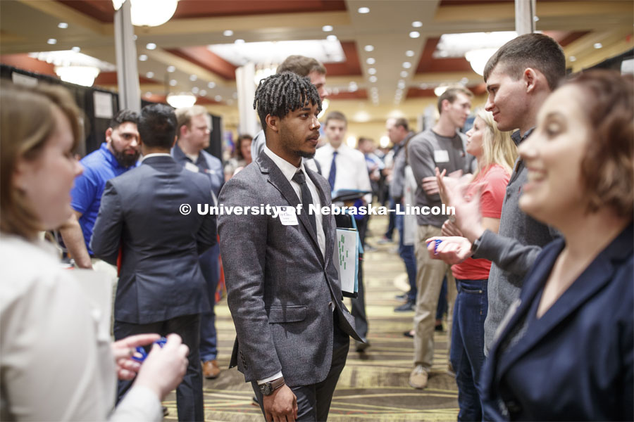 Jay Clark, senior in computer science, talks with a recruiter during day two of the Career Fair at Embassey Suites with emphasis on Science, Technology, Engineering and Mathematics. February 13, 2019.  Photo by Craig Chandler/University Communication.